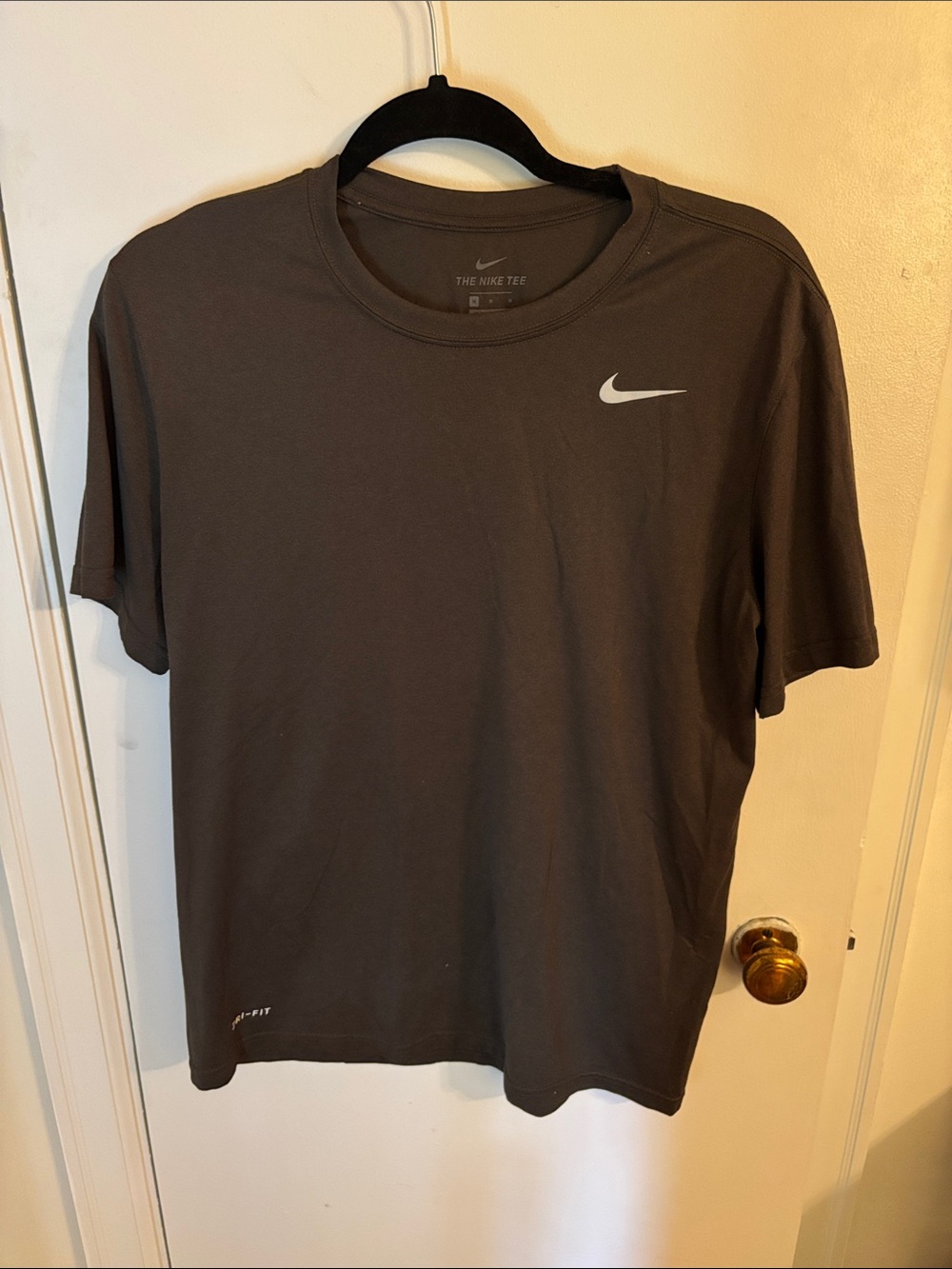 Nike women’s  Short Sleeve Dri-FIT Tee - dark green